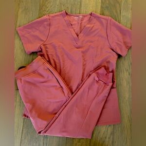 Medium set of Mandala scrub topics in mauve.